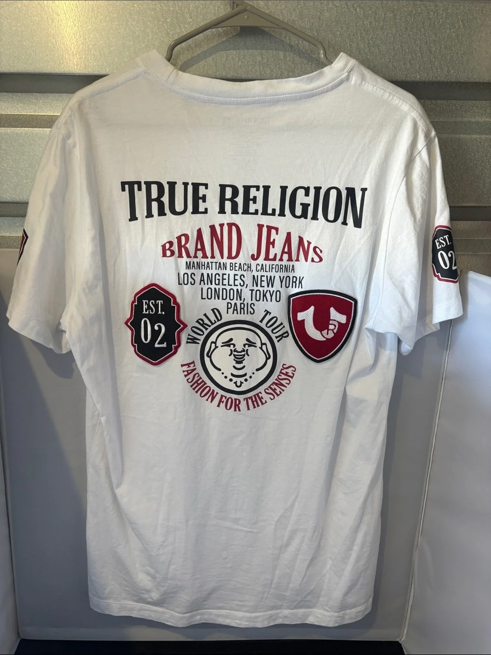 True Religion White T‑Shirt with Black Logo and Red Sleeve Patch